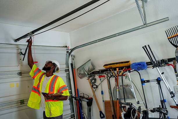 Professional Garage Door Panel Replacement technician working in Clinton, IA